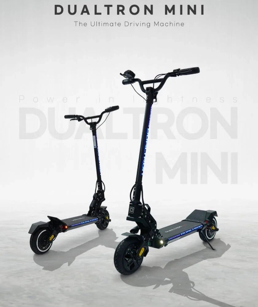Two Dualtron Mini electric scooters on a light gray background with brand name displayed.