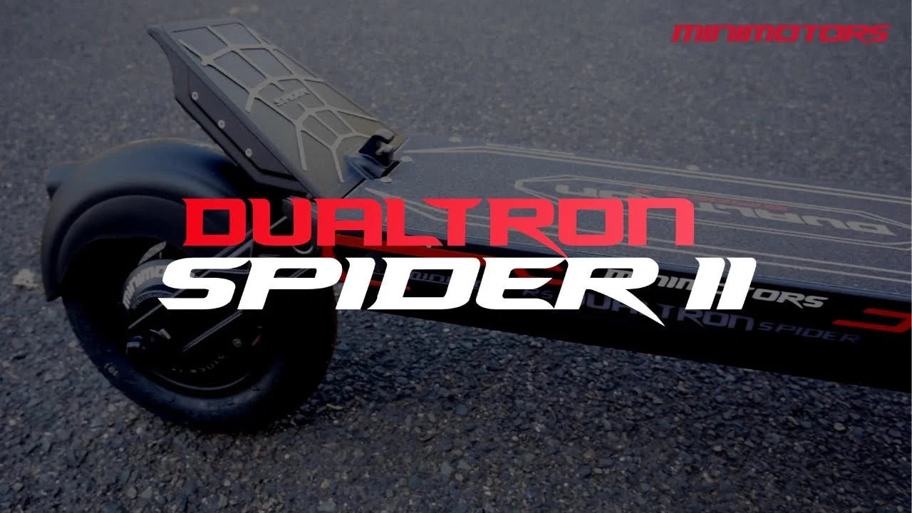 Dualtron Spider II hoverboard on a dark surface with brand name visible