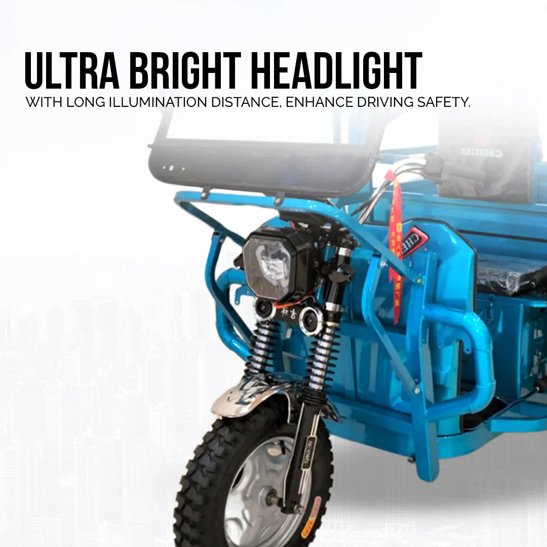 Blue motorcycle with ultra bright headlight feature on a white background