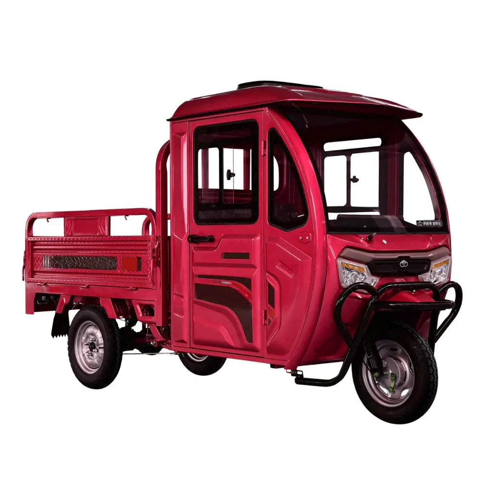 Red three-wheeled vehicle with a cargo bed on a white background