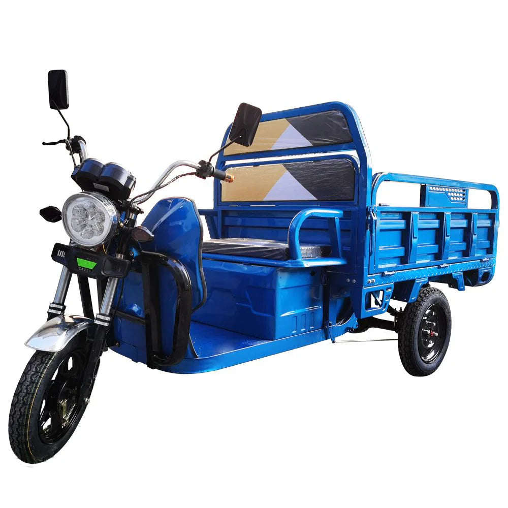 Blue tricycle with cargo bed on a white background