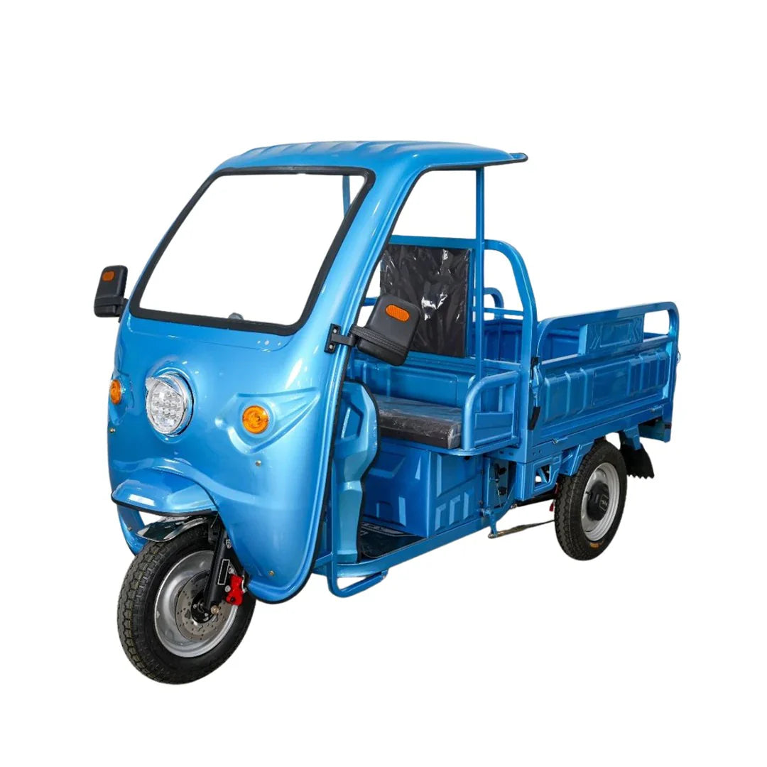 Blue three-wheeled motor vehicle with a cargo bed on a white background