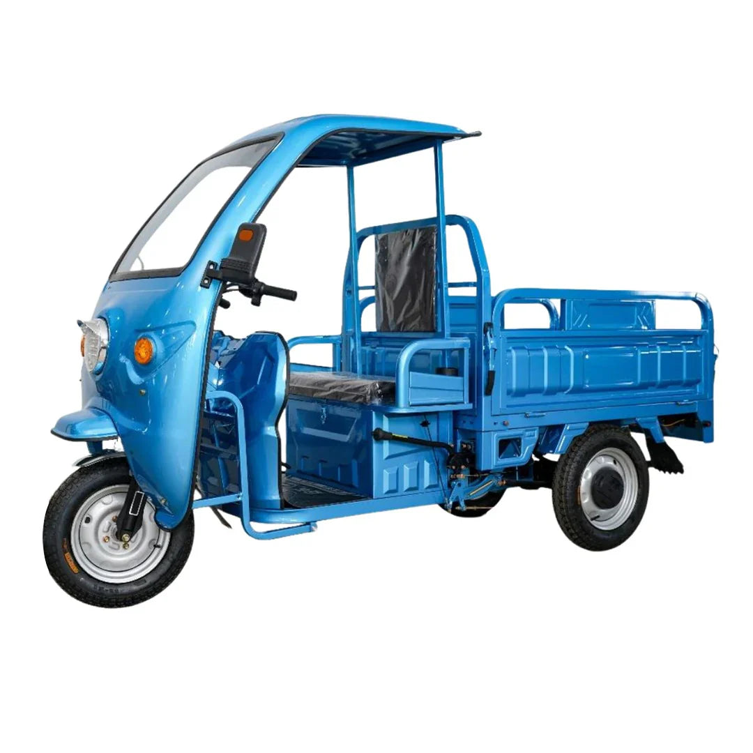 Blue three-wheeled motor vehicle on a white background