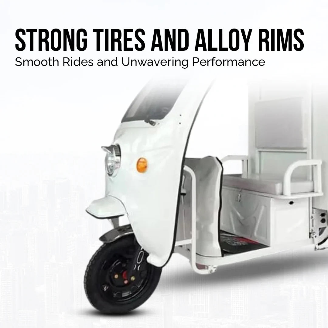 White three-wheeled vehicle with strong tires and alloy rims on a white background