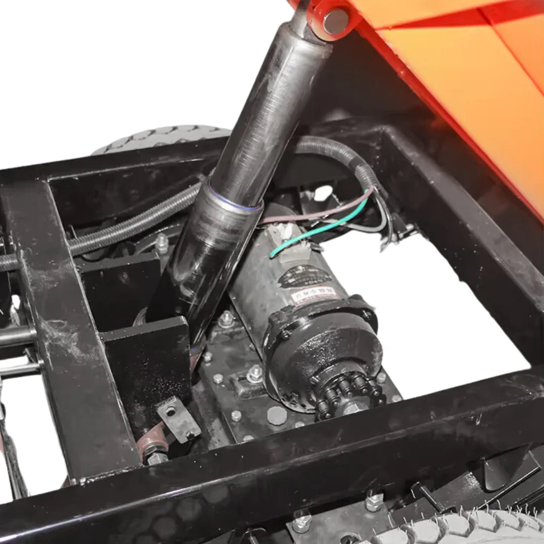 Close-up of a mechanical component on a vehicle with an orange background