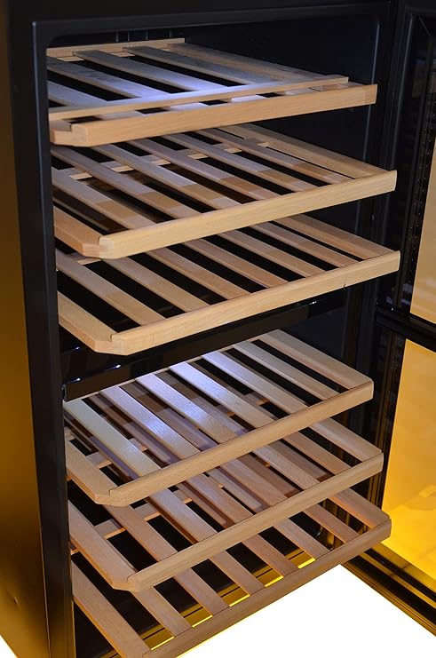 Wooden wine rack inside a wine cooler with wooden shelves.