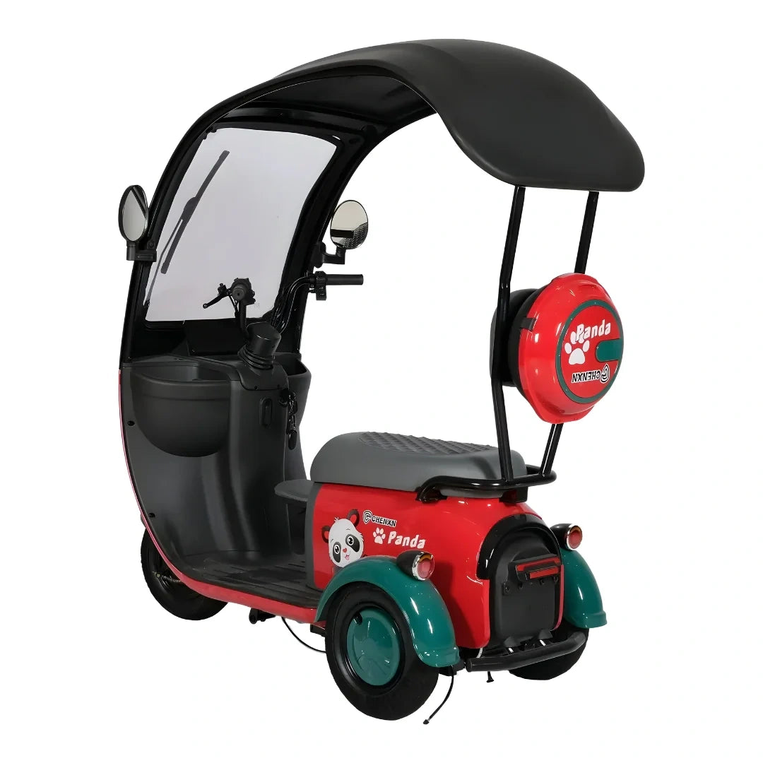 Small electric vehicle with a black and red design on a white background