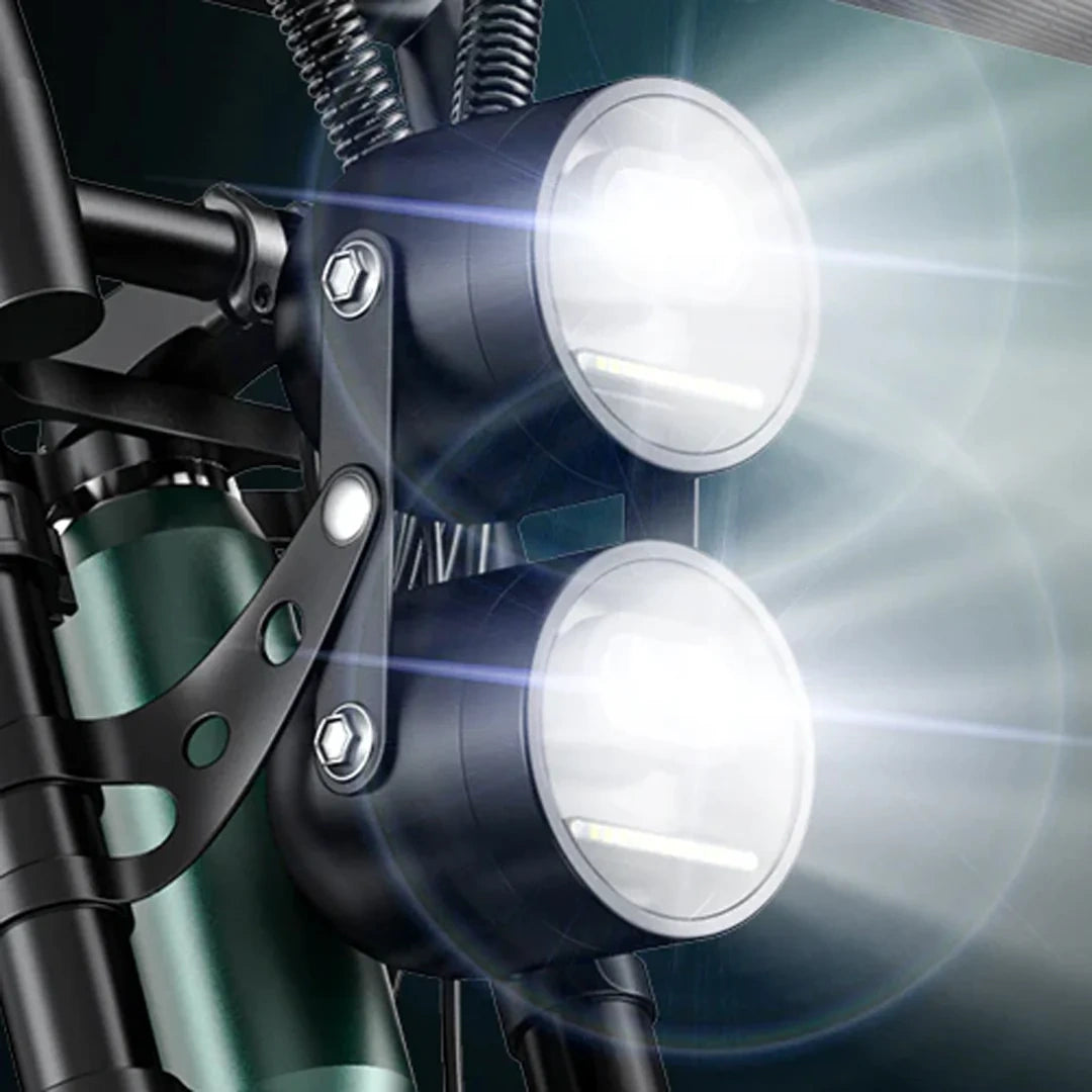 Close-up of motorcycle headlights with a blurred background