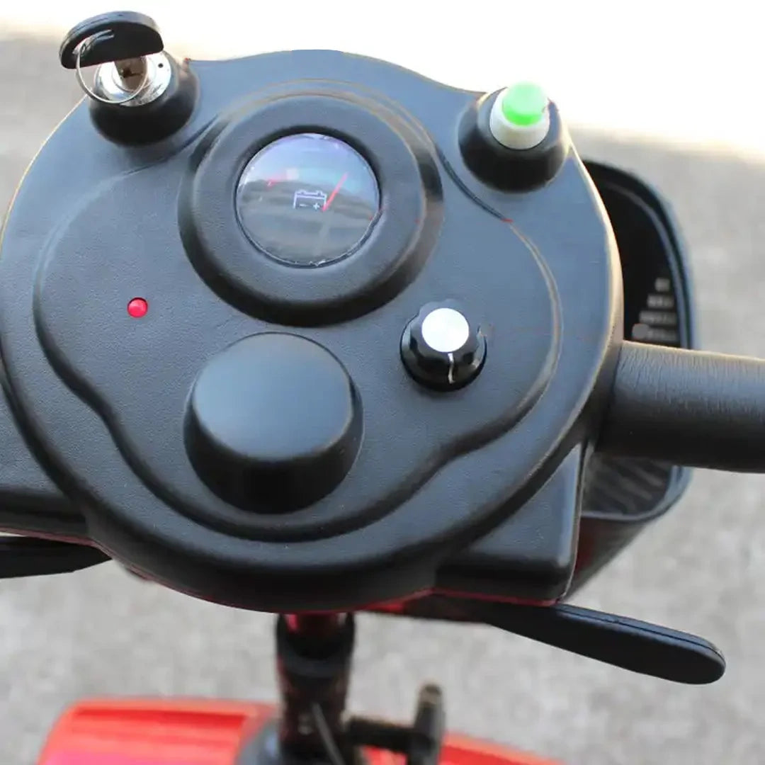 Close-up of a control panel on a vehicle with buttons and a display.