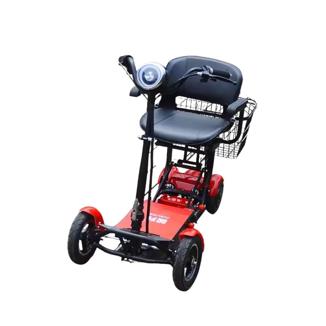 Red and black mobility scooter with a seat and basket on a white background