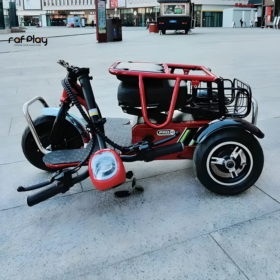 Red and black three-wheeled electric vehicle on a city street