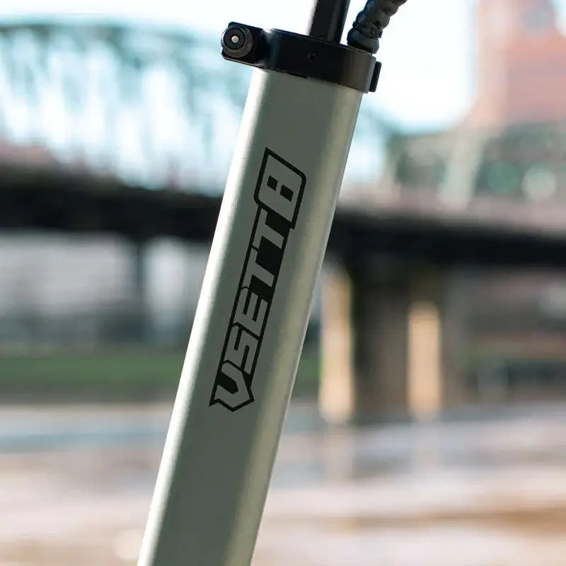 Close-up of a bicycle frame with 'Bettlo' branding against a blurred background