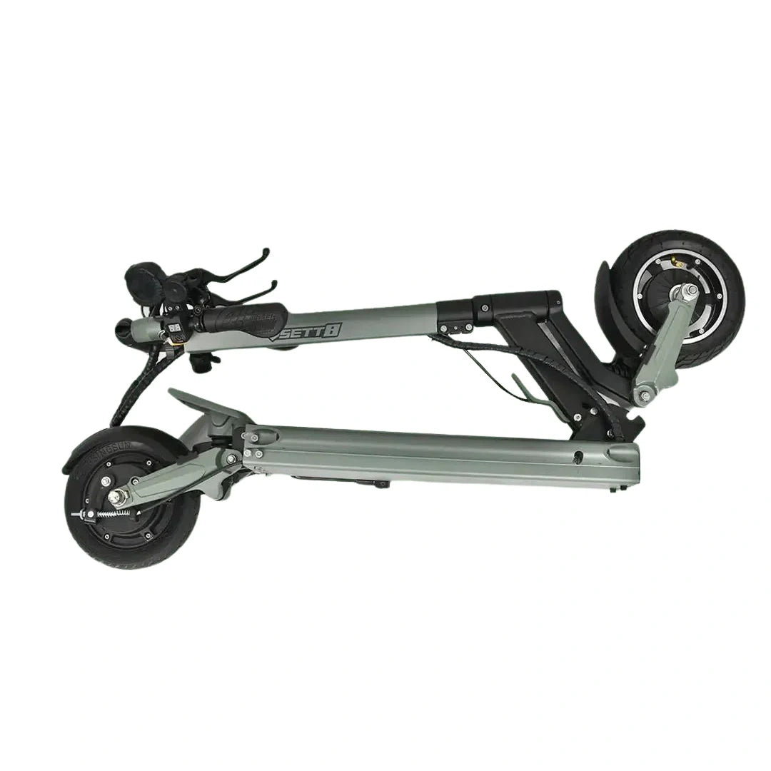 Foldable scooter with black wheels on a white background