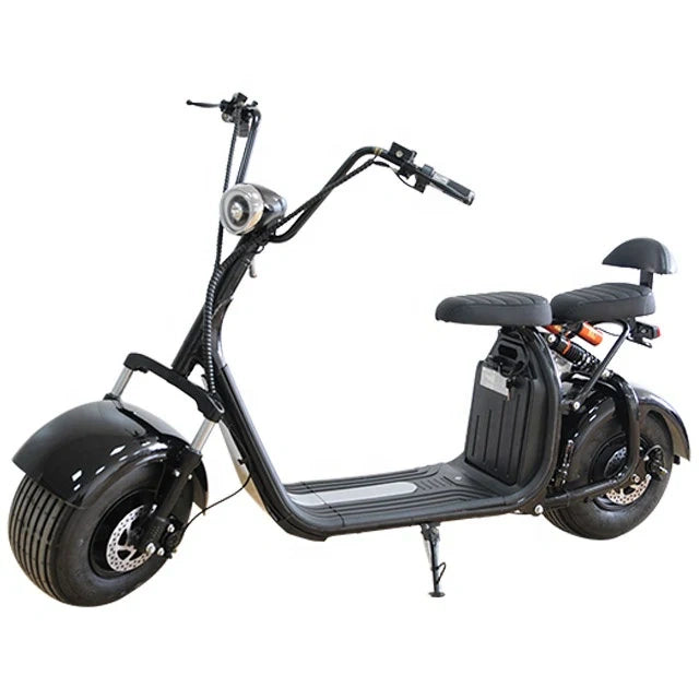 Black electric scooter with large wheels on a white background