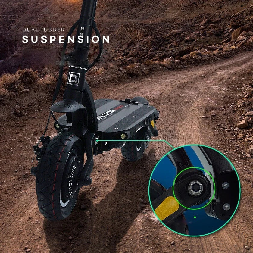 Electric scooter with dual rubber suspension on a dirt path, highlighting the suspension system.