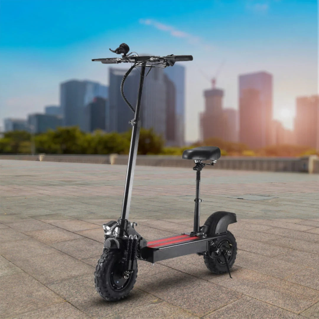 Electric scooter on a paved area with a cityscape in the background