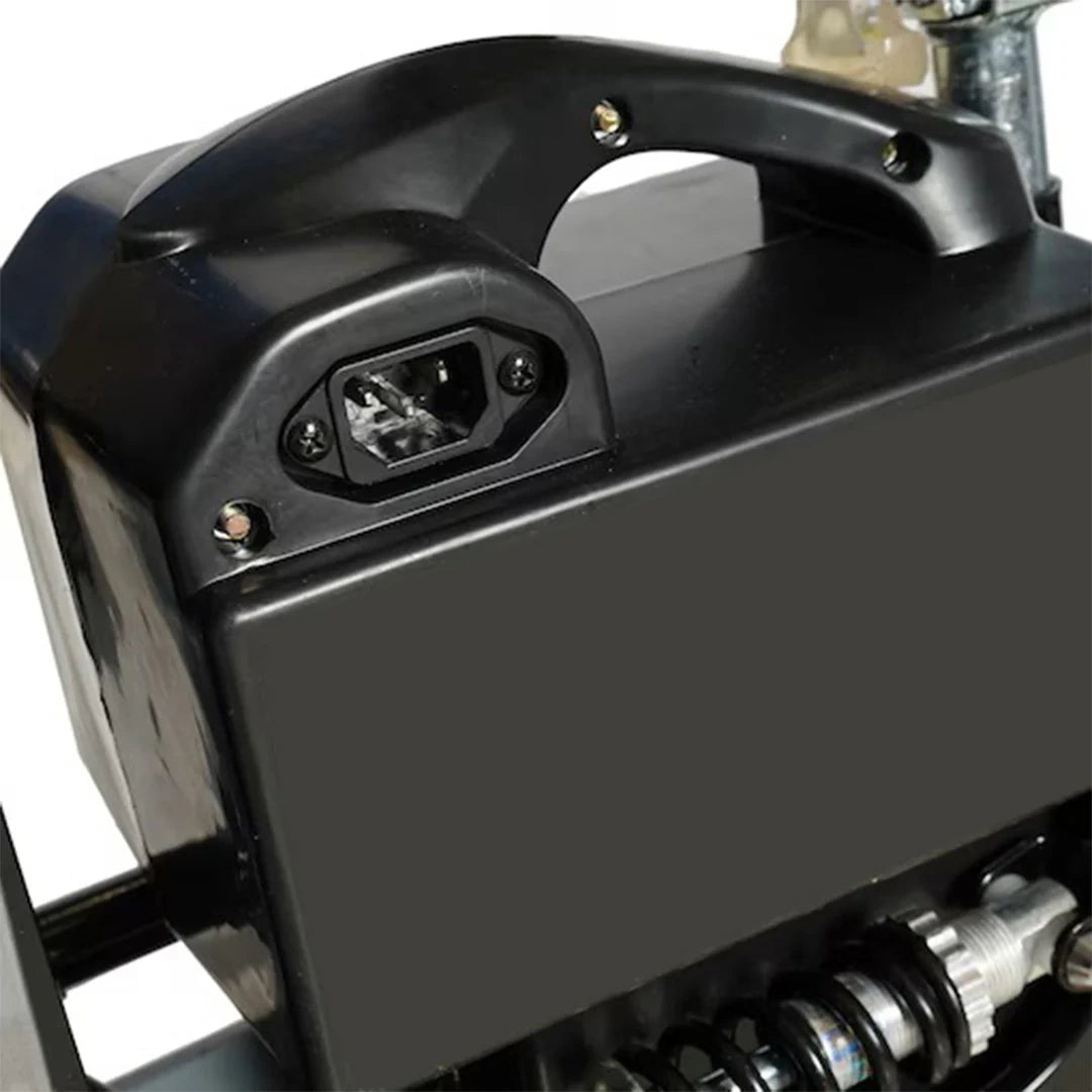 Close-up of a black motorcycle headlight assembly on a white background