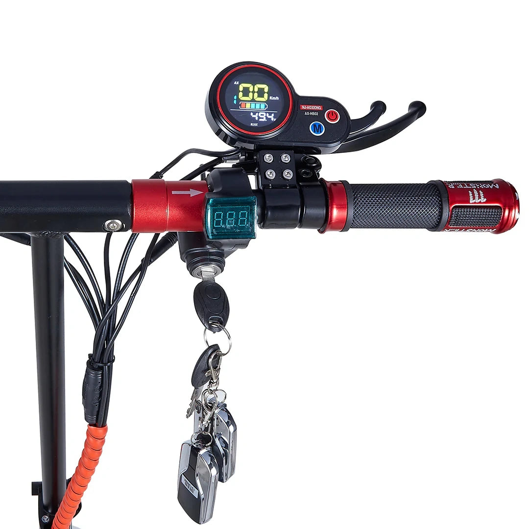 Close-up of a motorcycle handlebar with digital gauges and keychain on a white background