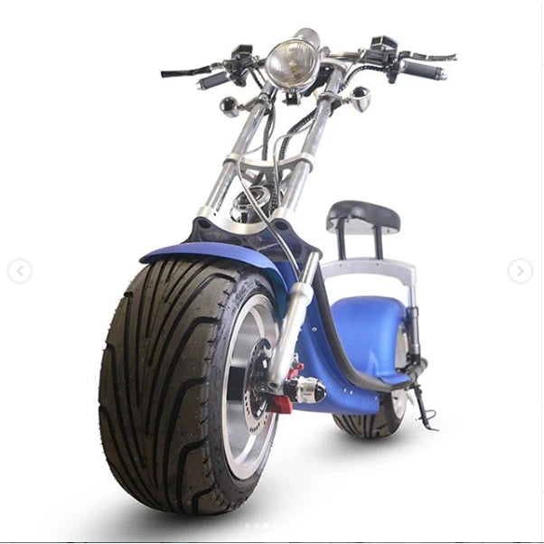 Blue and silver electric bike with large front wheel on a white background