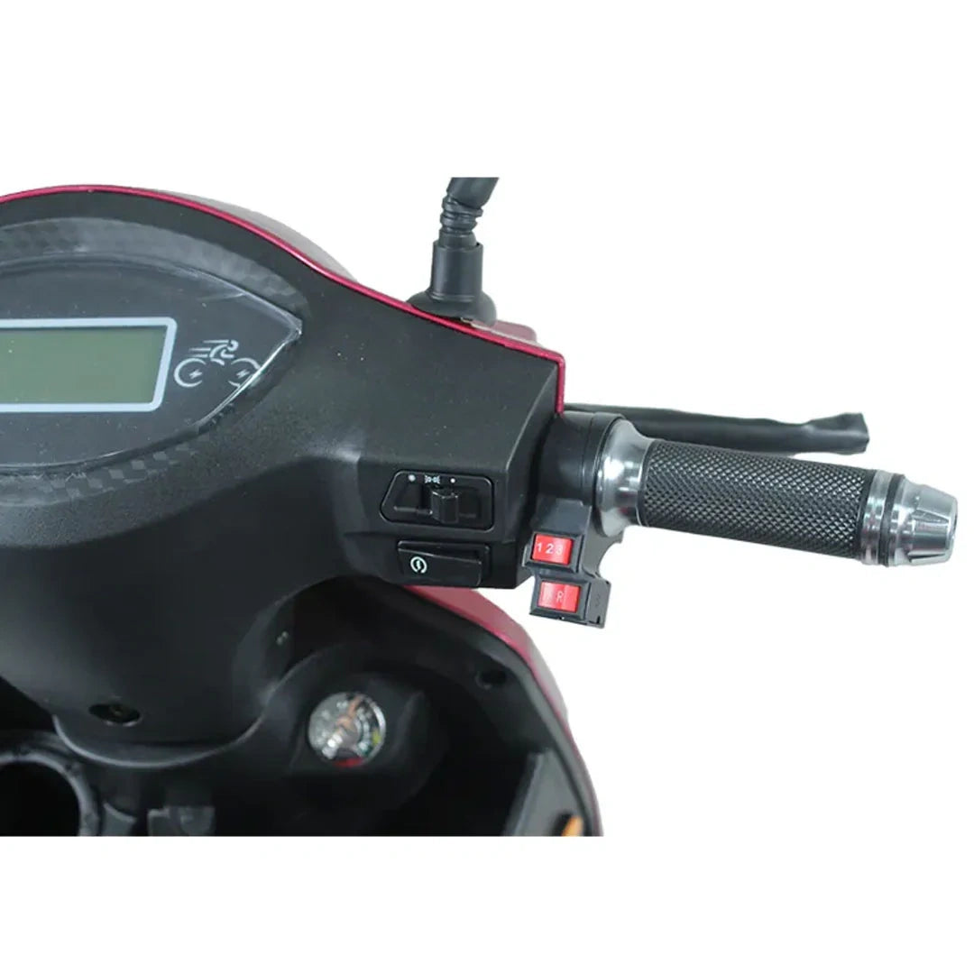 Close-up of a motorcycle handlebar with control buttons and display on a white background