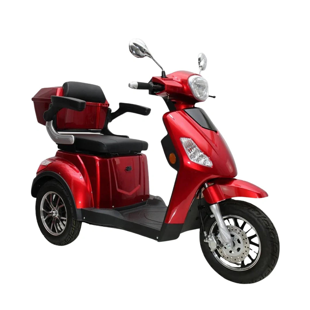 Red three-wheeled scooter on a white background