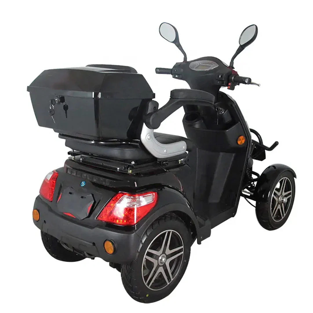 Black three-wheeled mobility scooter with storage box on a white background