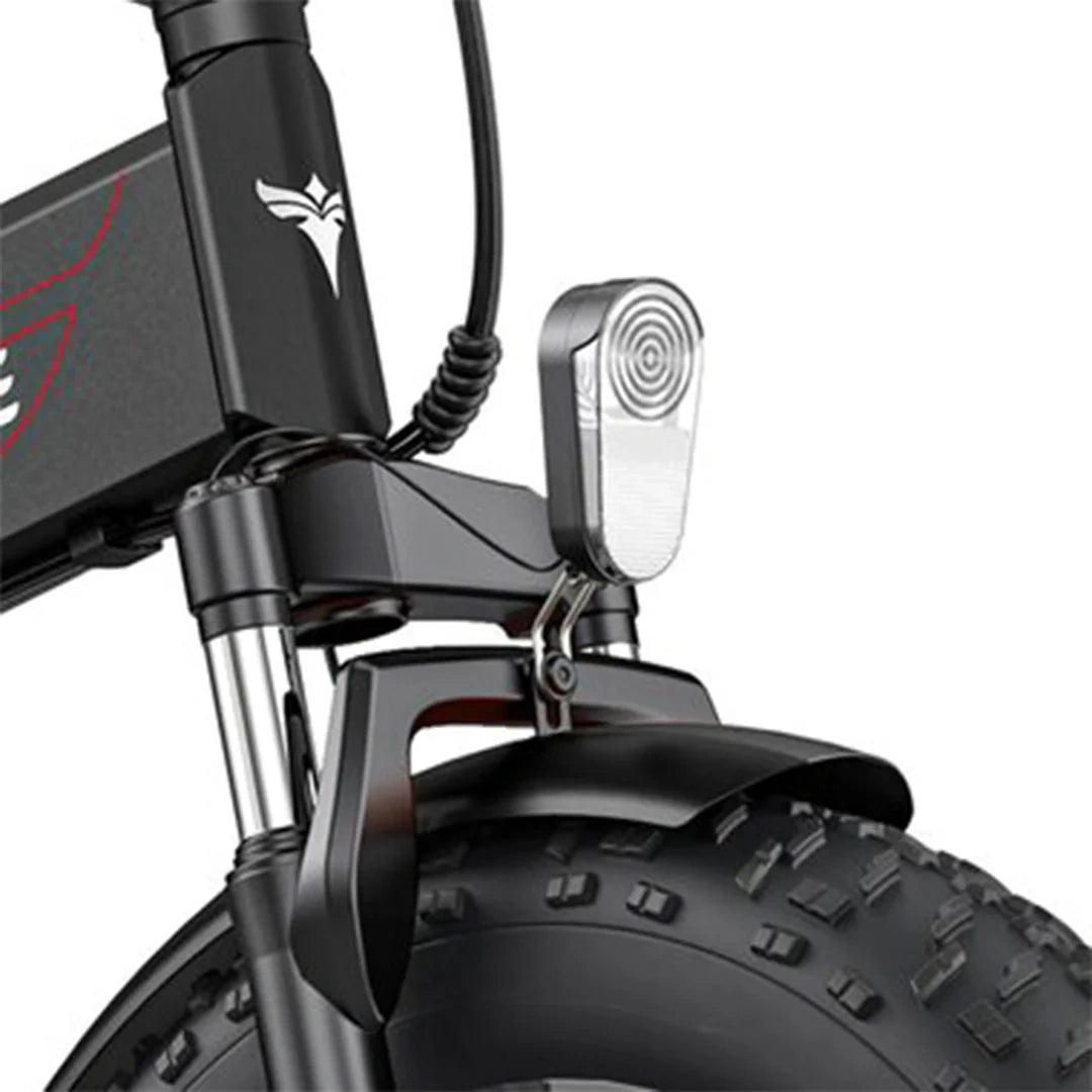 Close-up of a black electric scooter with a headlight on a white background