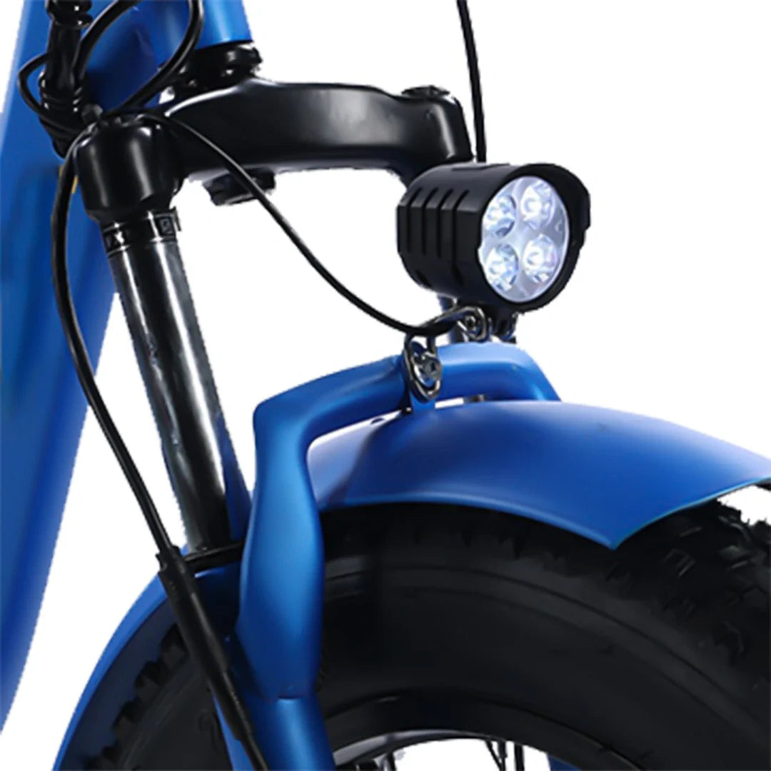 Close-up of a blue electric bike with a headlight on a white background