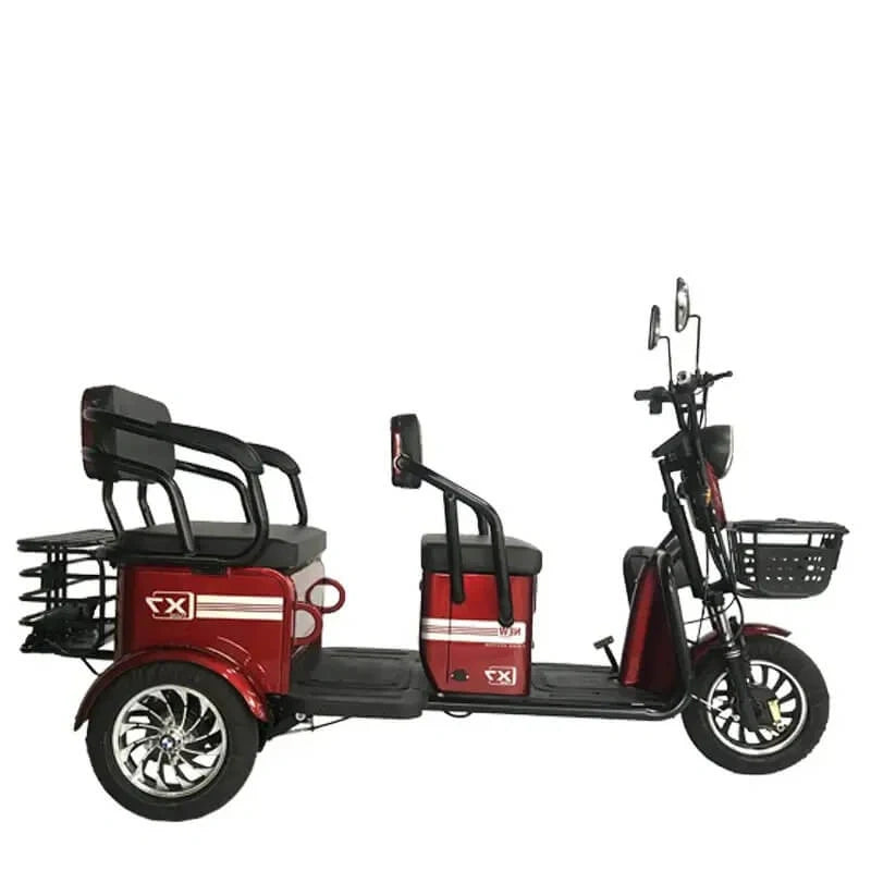 Red electric tricycle with a seat and cargo area on a white background