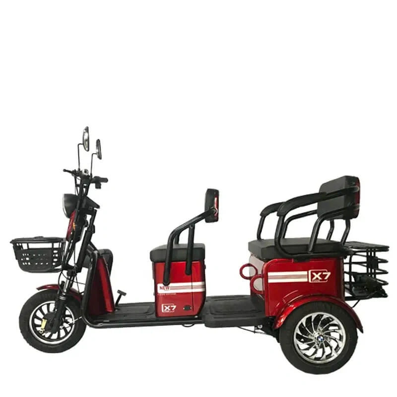 Red electric tricycle with black seat and basket on a white background