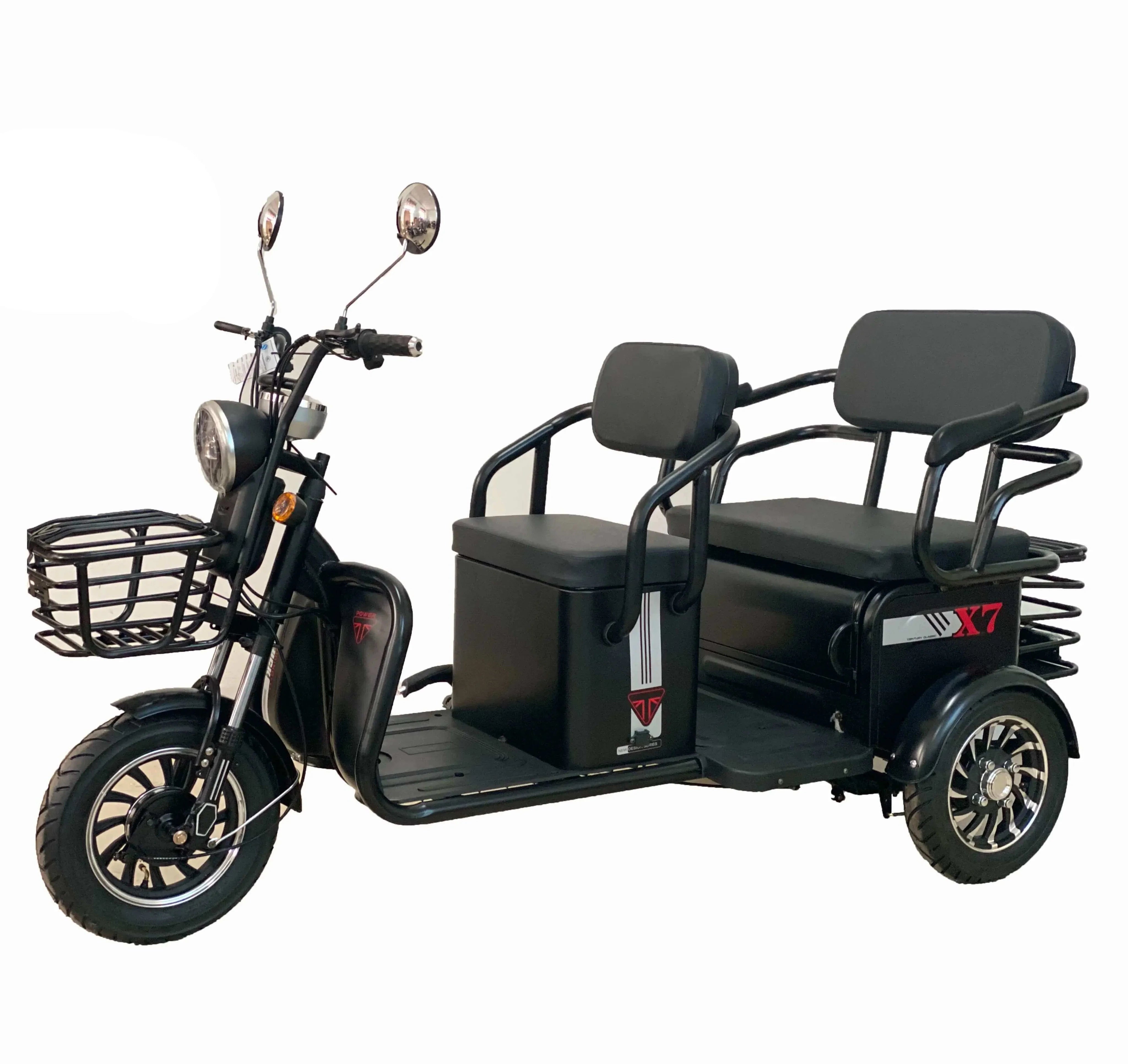 Black three-wheeled electric vehicle with a basket and seats on a white background