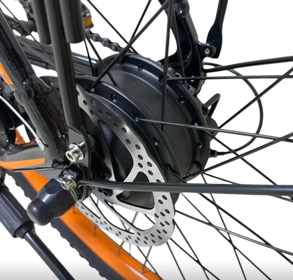Close-up of a bicycle wheel with an electric bike motor on a white background