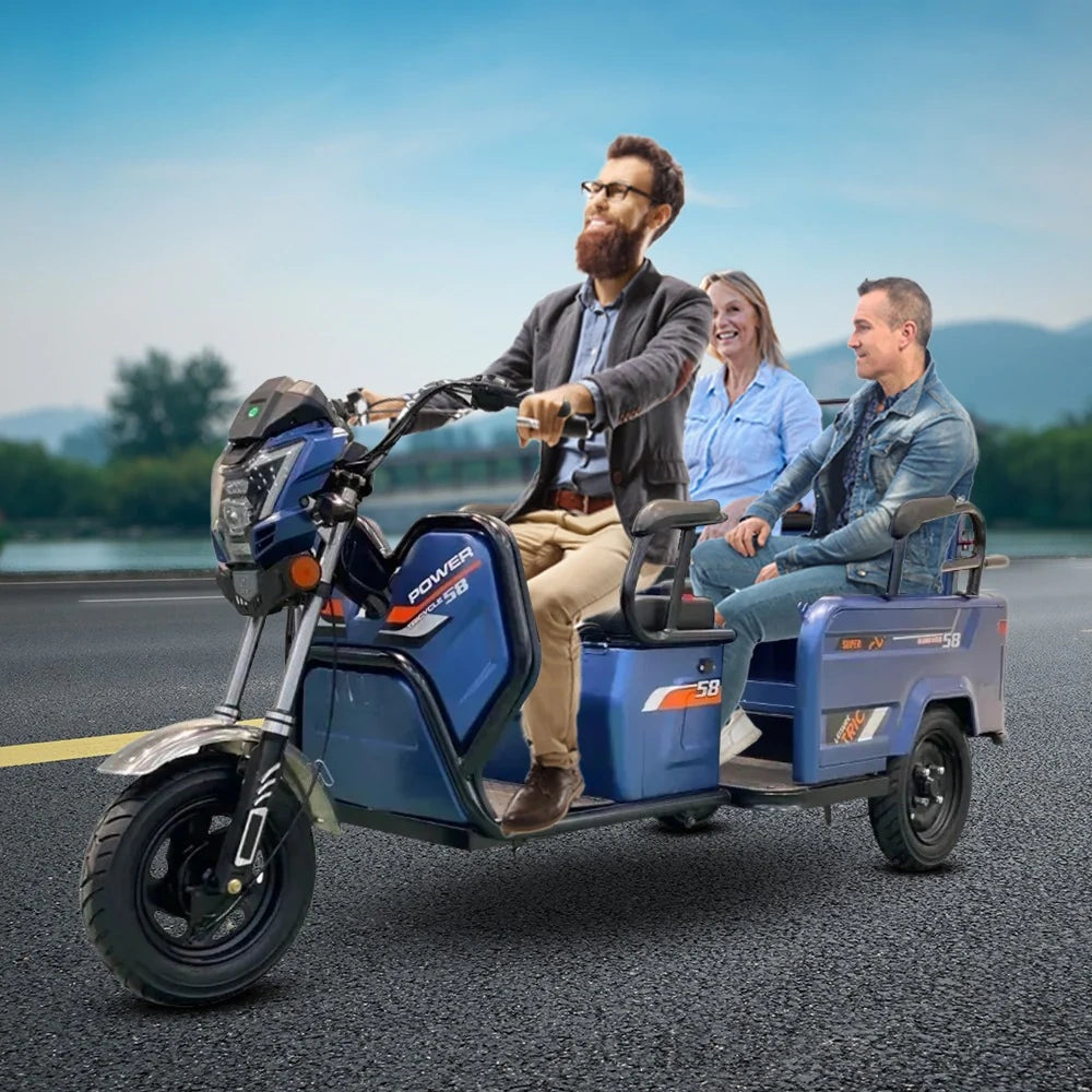Blue electric scooter with a sidecar carrying two passengers on a road.