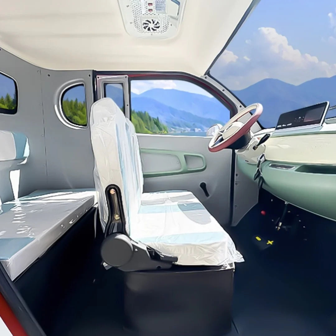 Modern vehicle interior with steering wheel and dashboard, scenic view outside