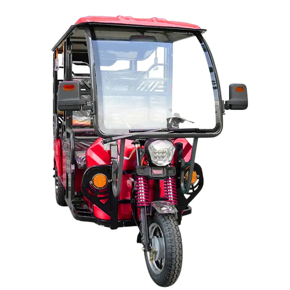 Red and black three-wheeled vehicle on a white background