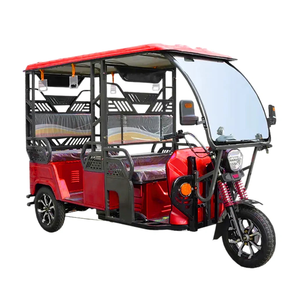 Red electric rickshaw on a white background