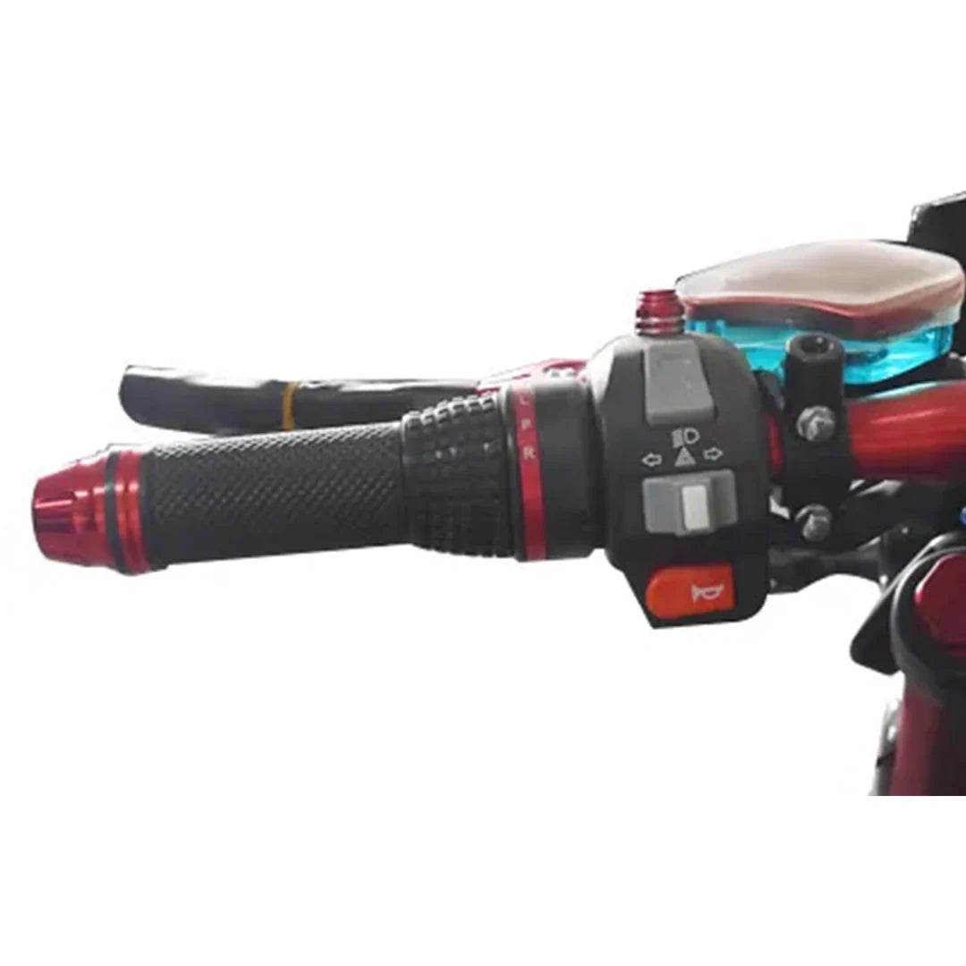 Close-up of a motorcycle handlebar with control buttons on a white background