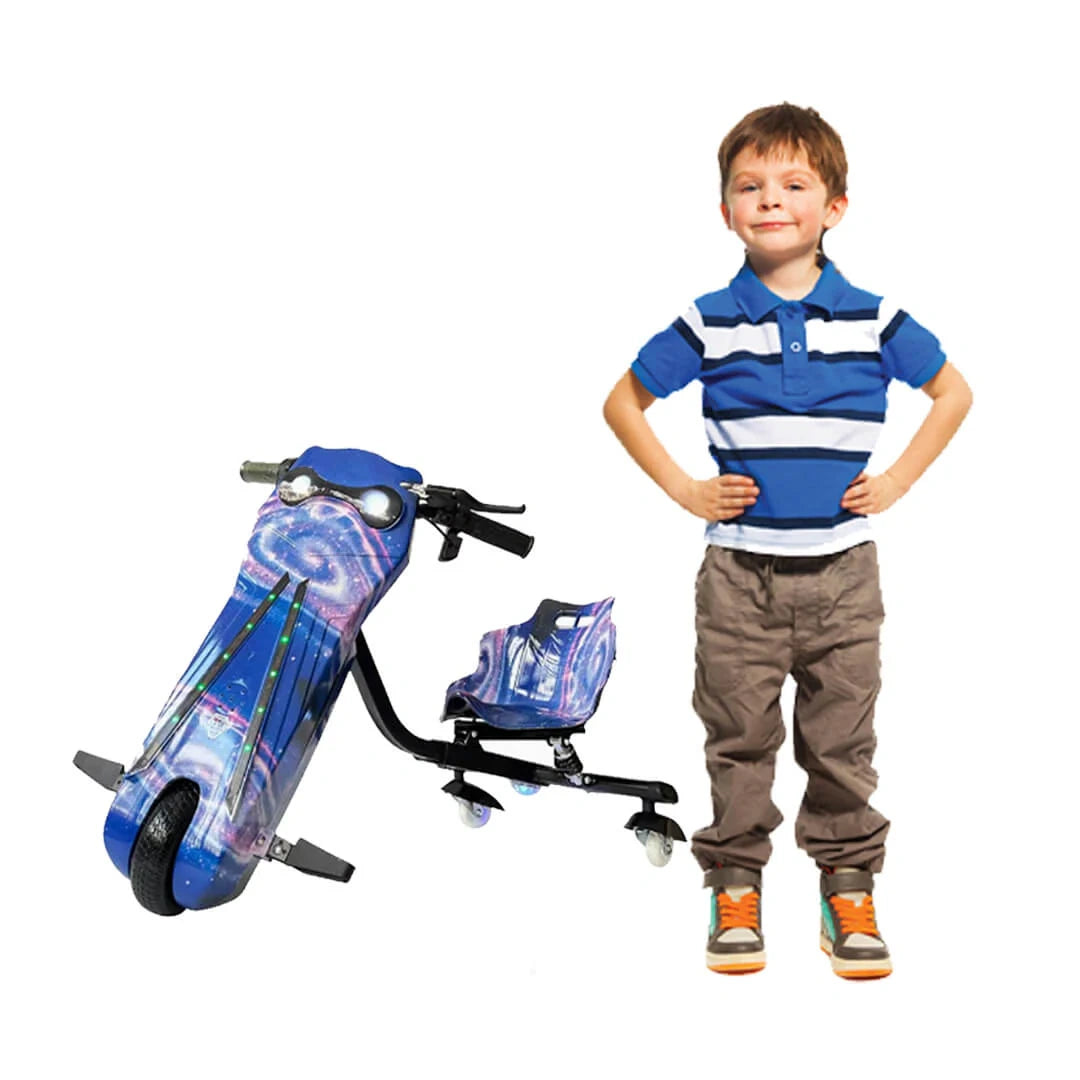 Child standing next to a blue and black scooter on a white background