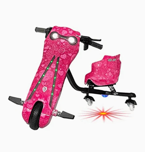 Pink scooter with heart pattern on a white background