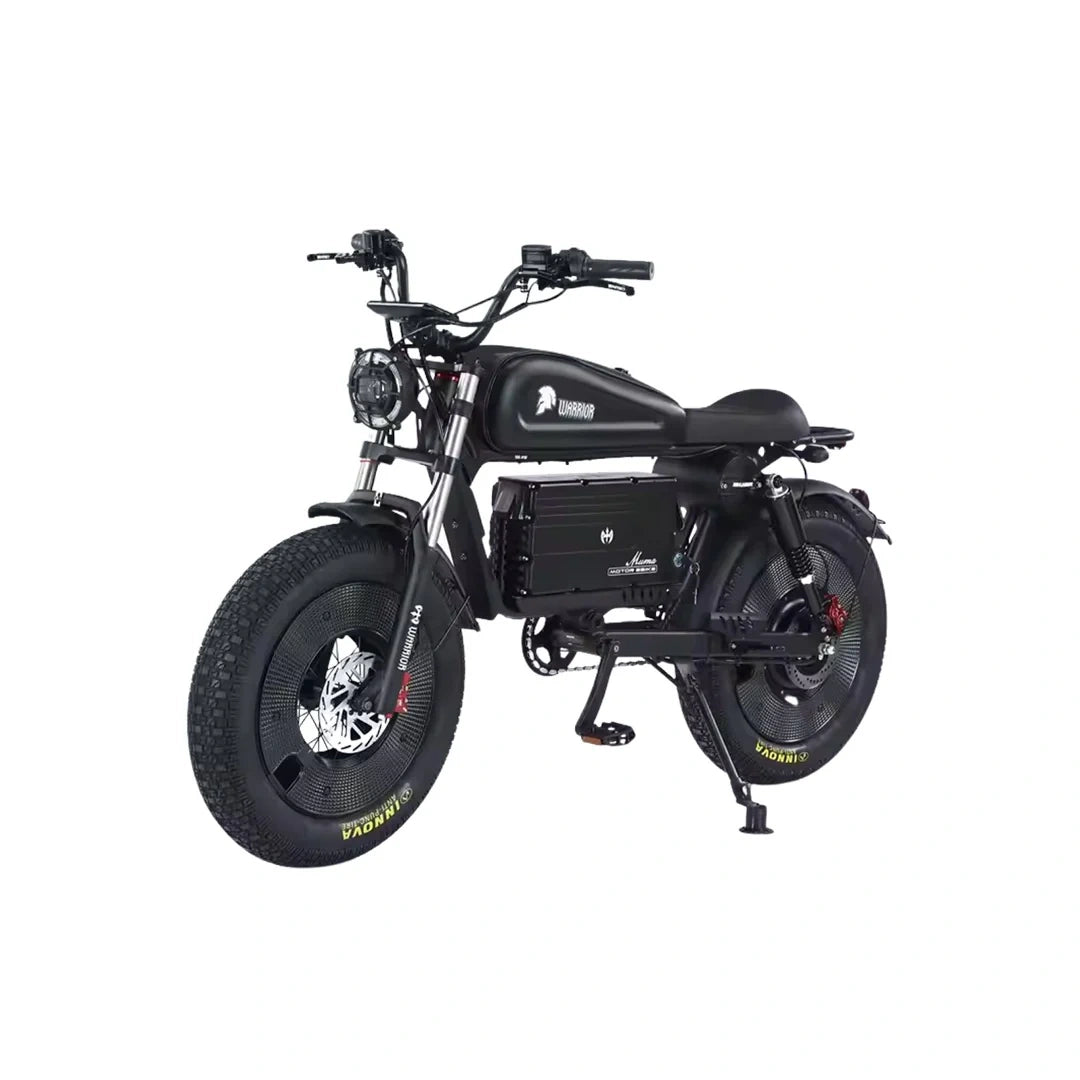 Black electric bike with large tires on a white background