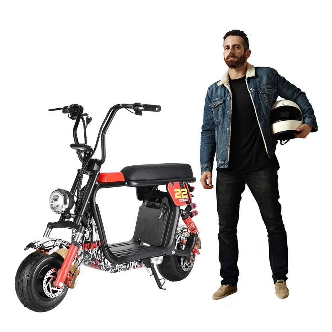 Man standing next to a black and red electric scooter on a white background