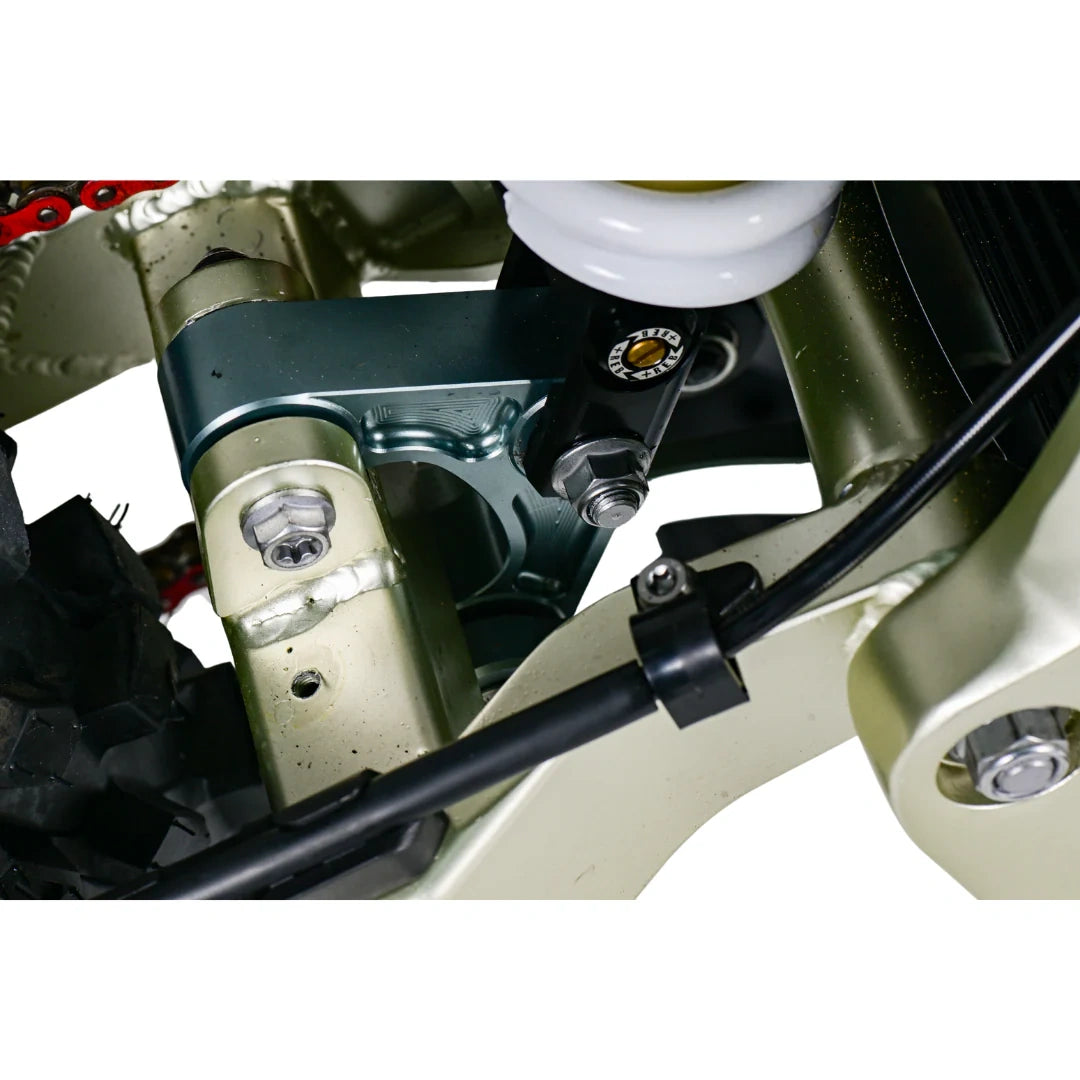 Close-up of mechanical components with a focus on bolts and metal parts.