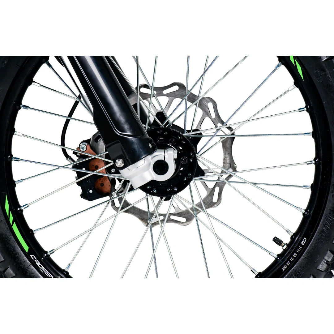 Close-up of a bicycle wheel with hub and spokes on a white background