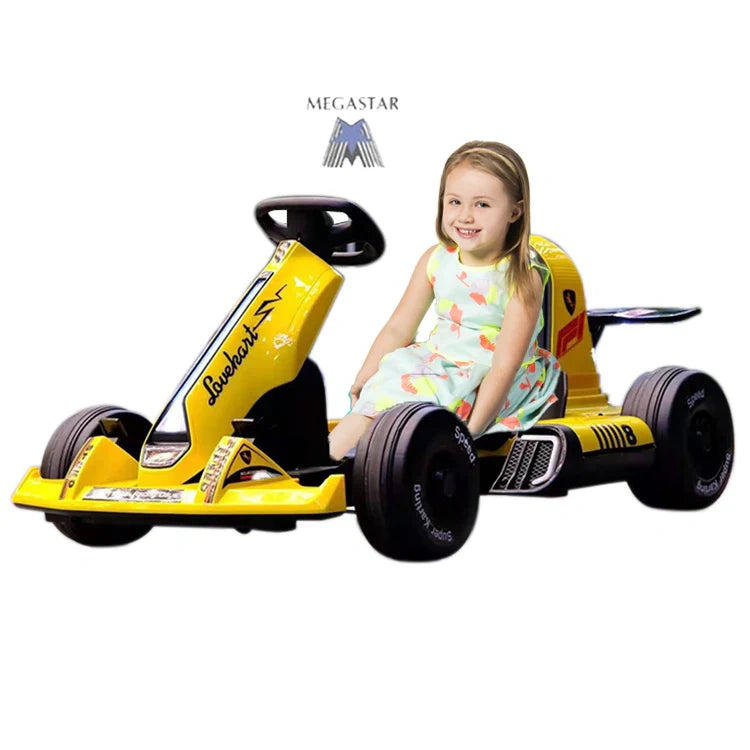 Child sitting in a yellow toy go-kart with Megastar branding on a white background