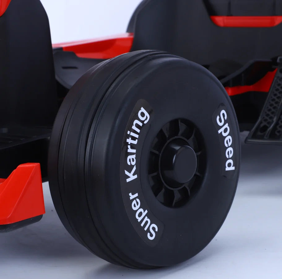 Close-up of a black kart tire with 'Super Karting Speed' branding on a white background