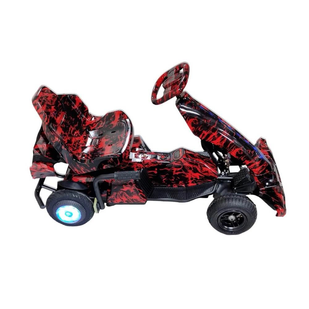 Red and black toy go-kart on a white background