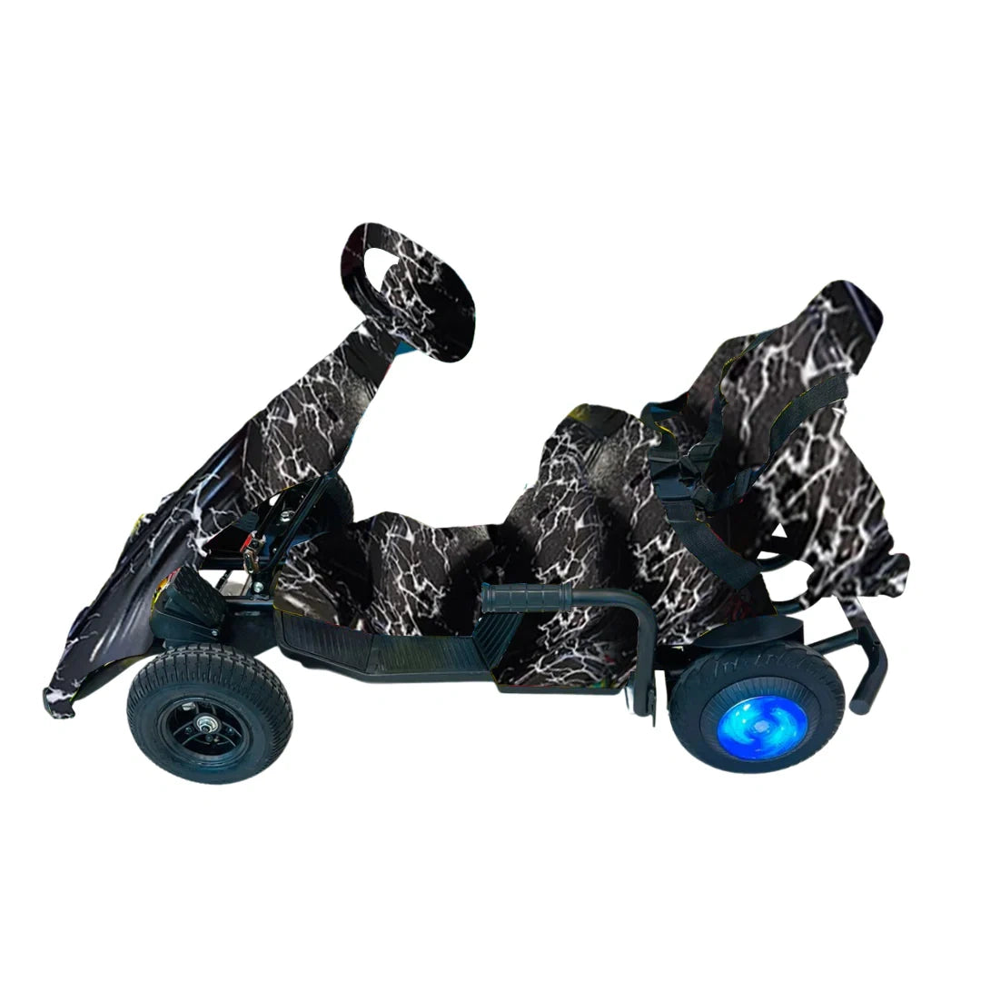 Children's toy car with black marble pattern and blue lights on a white background