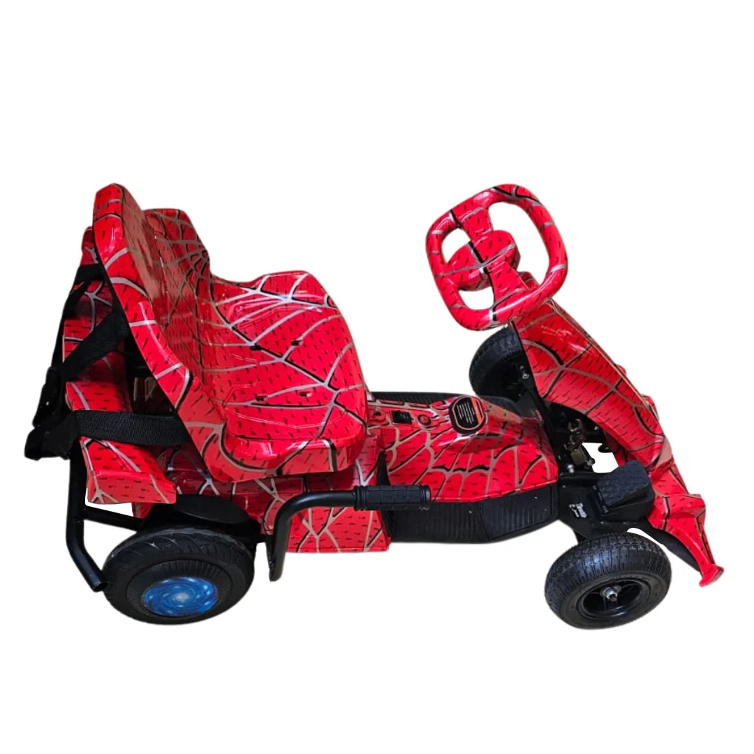 Red toy car with spider web pattern on a white background