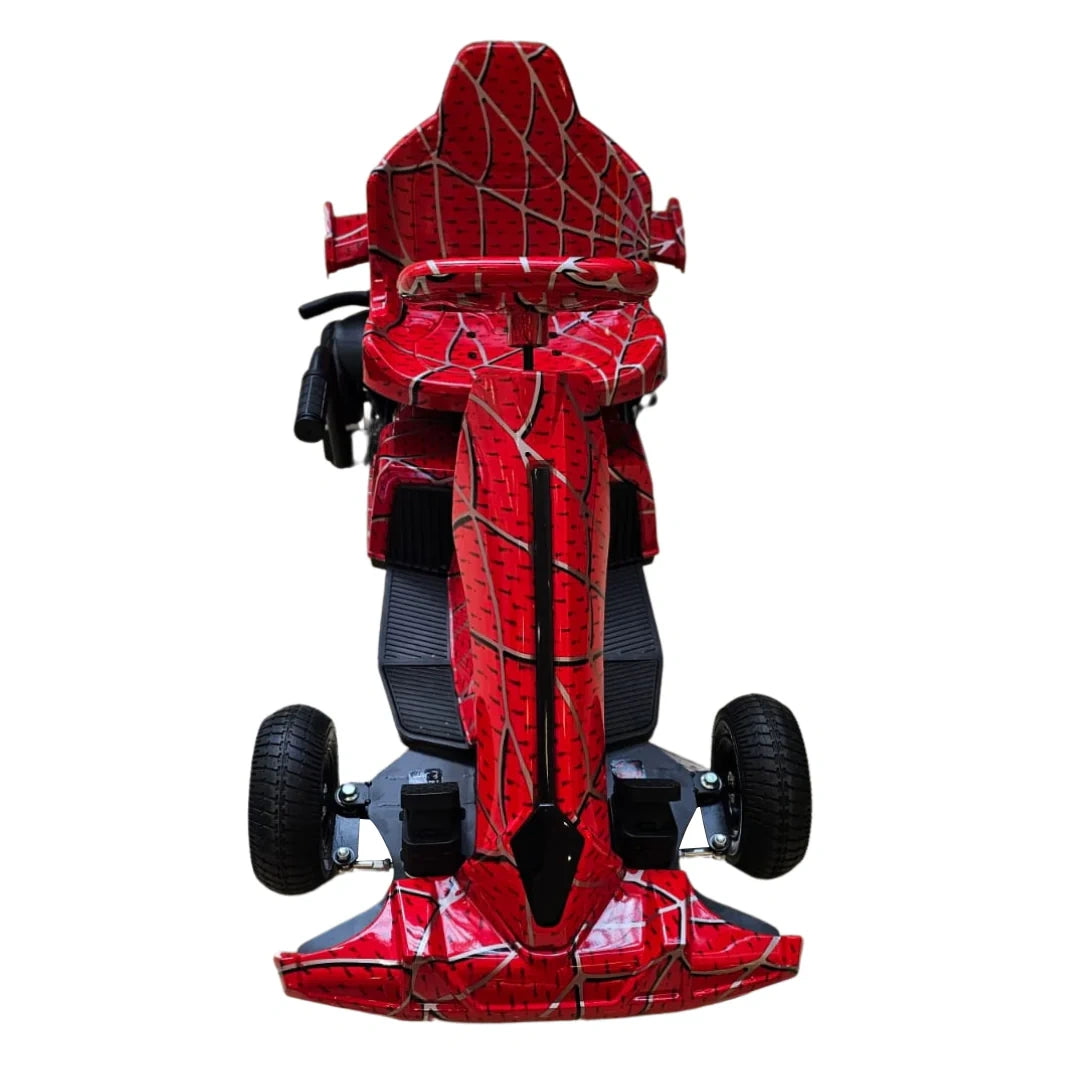 Red and black spider-themed scooter on a white background