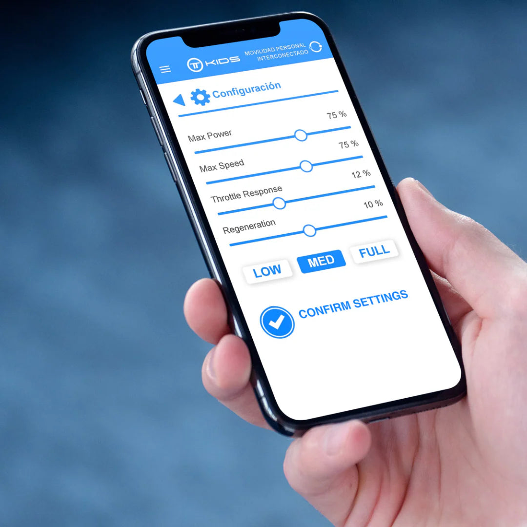 Hand holding a smartphone with an app interface on a blurred blue background